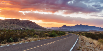 A sunset along a highway at Big Bend Ranch State Park, Texas